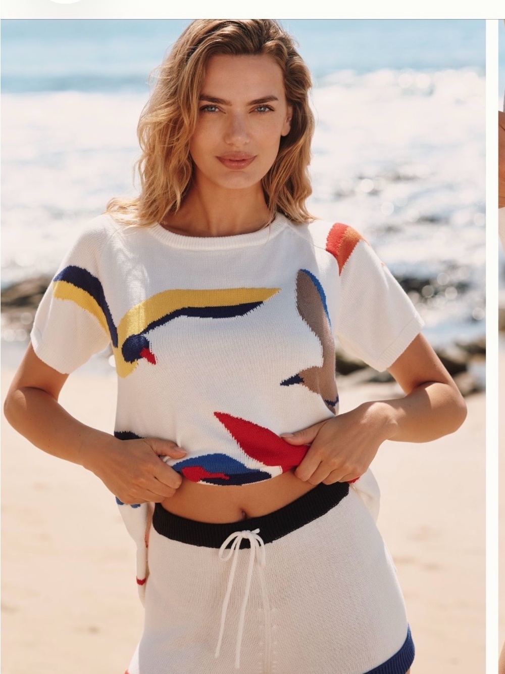 Women’s White Short-Sleeve Knit Top with Multicolor Bird Motif
